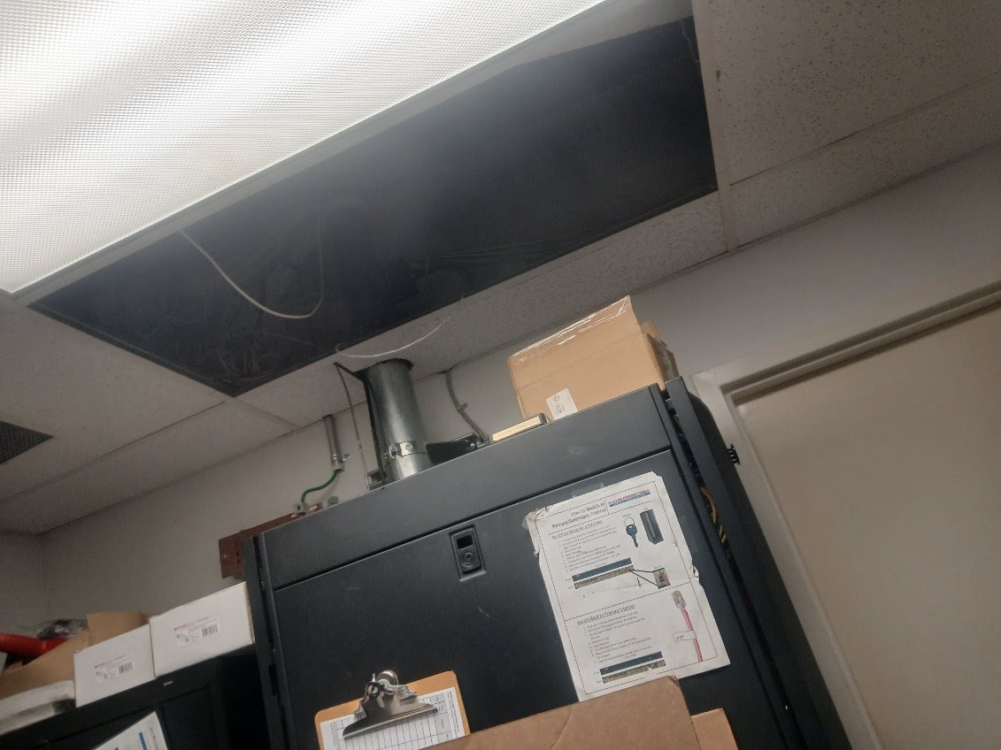 Open suspended-ceiling area above commercial equipment